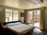 Our Cowboys Hideout is on a working horse ranch with spectacular mountain views! Hotels near Slick Rock Recreation Area