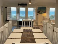 Condo with wide-open ocean views and only steps from beach