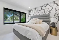 Modern Oasis Miami - luxury rental home close to airports, beaches & shopping.