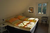 Cottage on park-like grounds with pond Hotels in Nordstrand