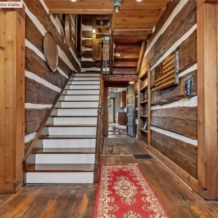Historic 200 year old 3-bedroom log house with WiFi and AC in charming Winesburg