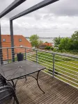 Modern top floor apartment with a view of the sea and Stralsund