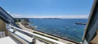 Superb sea view for this apartment in the center of Concarneau with parking.