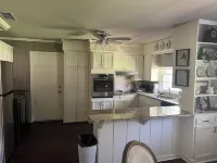 Beautifully updated 3bedroom 2 bath home with a large glassed in sunroom.