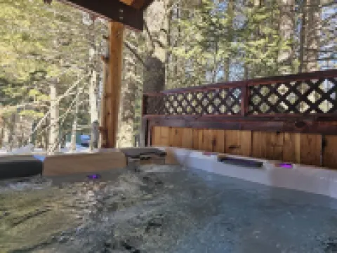 New to VRBO- Wooded cabin, close to Yellowstone with a hot tub