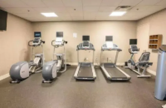 Cozy Retreat with Rooftop Pool, Parking, and Spacious Comfort