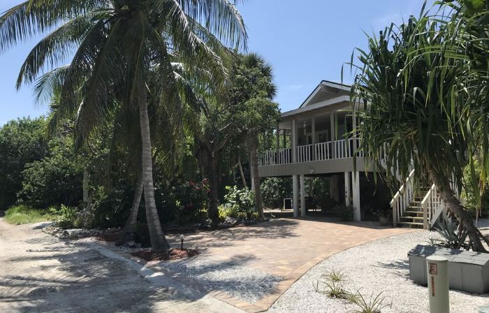 Romantic beach home with golf cart Remodeled Coastal charm
