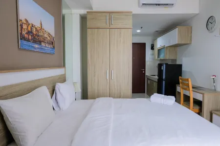 Simply Minimalist Studio Apartment at Springwood Residence Отели в г. Pinang