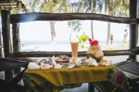 Moonshine Uroa Boutique Hotel - breakfast