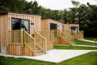 The Cabins - House of Juniper Hoteles en Kyle