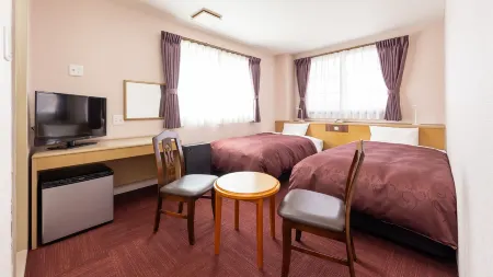 Sanda Sunrise Hotel Отели в г. Санда