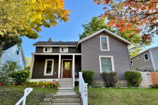 Fenced Backyard with Fire Pit and Outdoor Seating - Charming Bungalow