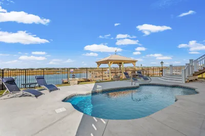 Waterfront Oasis with Private Dock and Pool - Stunning Coastal Retreat Hotels near Frankie's Fancy's