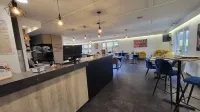 Kyriad Bellegarde - GENÈVE Hotels in Brenod
