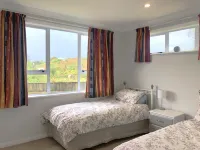 Family holiday home at Waitarere Beach. Hotels in Waitarere