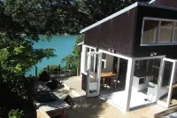 Stylish waterfront retreat - dramatic 180 degree views!