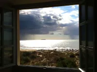 large terrace overlooking the sea and the sand dunes