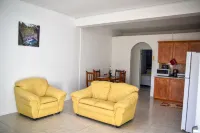 Large 2 Bedroom 2 Bathroom Apartment #4 in Roseau. Bus stops right in front! Hotels in Loubiere