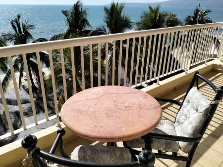 Condo at front of the beach inside a Resort compound hotel.