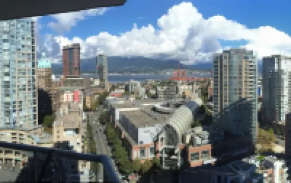 Luxury Downtown Ocean+Mountain views A/C Comfort Pool / hot tub/ sauna/ gym