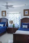 Canal Front Private Home in Treasure Cay, Bahamas With Dock and Generator