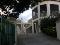 Villa with large pool, screened terrace overlooking Caribbean.