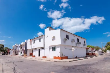 Hostal Casa Guajira Отели рядом с достопримечательностью «Su lin khaw»