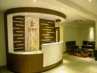 Emarald Hotel Calicut فنادق في كوزيكود