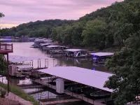 Lake Front Home with Boat Slip and swim platform dock