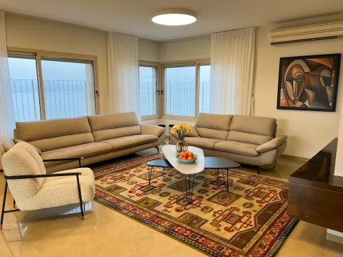 sea view penthouse with 3 floors and an hot tub! can host up to 15 people .