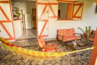 Gîte Alpinia 4/6 pers in the residence Les Jardins de Pointe Noire, swimming pool Hotels in Pointe-Noire