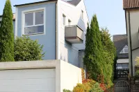 Vacation home Traumblick directly on the lake in Bad Weißenstadt in the Fichtelgebirge. Hotel a WeiBenstadt