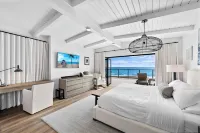 Spacious 5-bedroom Beachfront Home on Beach Road!