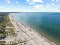 Charming Seaside Cottage  Sleeps 9 with WiFi, AC, 2 Min Walk to a Private Beach