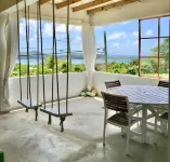 Sea view apartment with endless breeze, lush garden...nature and animals lovers