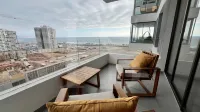 Hermoso depto de 1D terraza y vista mar - Homestays