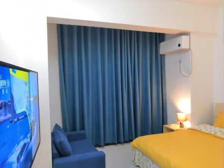 Lazy Cat Apartment (Xinglong Middle Road) Отели в г. Bobai