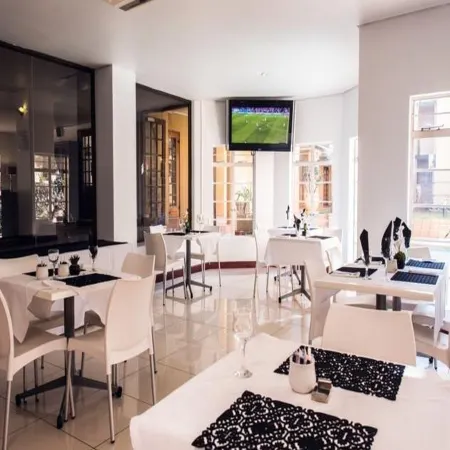 Airport Inn and Suites Отели рядом с достопримечательностью «Императорский дворец»