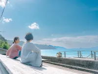 Denpaku Umimiru Yane No Yado <Amamioshima> فنادق في سيتوتشي