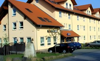 Hotel Parqeo im A66 - Housity