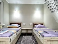 Status House Hoteles en Ferganá