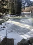 Cozy Creekside Condo (ground level, end unit)