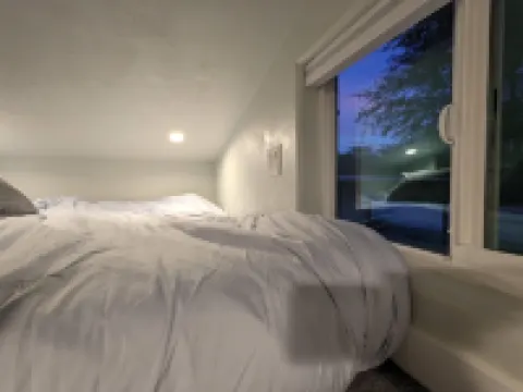 Tiny House with Loft Bed, Kitchenette, Parking in a Quiet Downtown Neighborhood