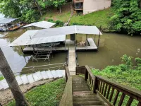 Secluded Lake of the Ozarks Vacation Home Waterfront with a Covered Dock.