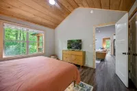 Cozy Boho Cabin with Hot Tub and Resort Amenities Access Hotels near Parks Place Convenience Store