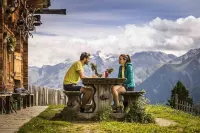 Top Vacation Apartment with Garden & Terrace, Bike Room, Garage, Cron 4 Sauna & Pool Hotels in Riscone