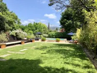 Downtown St. Helena retreat with pool, bocce ball and privacy. Permit #PL23-019
