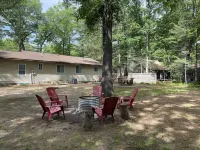 Torch Lake 4 bedroom home w/ large yard & parking