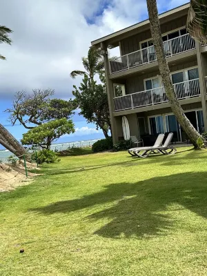 Amazing views from this ground floor, corner unit steps from the beach!