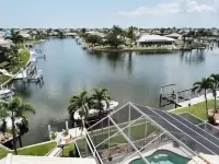 INCREDIBLE WATER VIEW!! NEW LUXURY REMODELED HOME; HEATED SALT POOL, GOLF NEARBY
